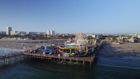 santa monica pier late afternoon in the summer orbiting drone shot