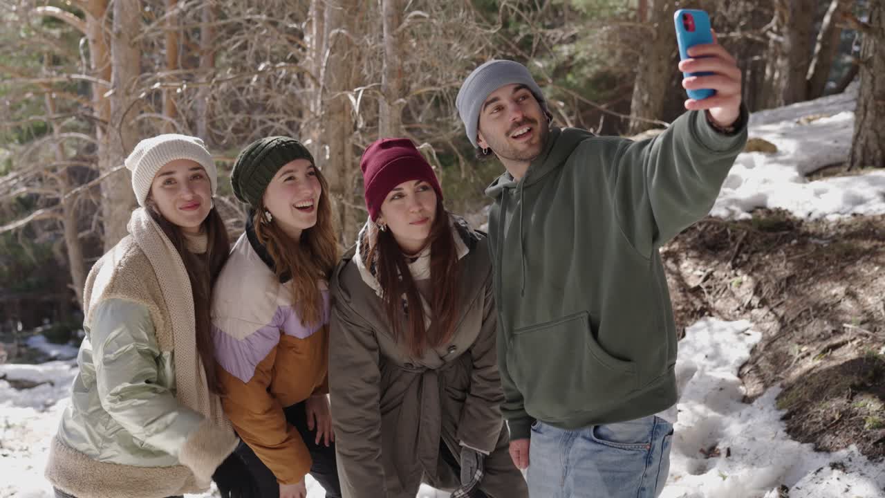 Group of Friends Taking a Selfie in the Snow