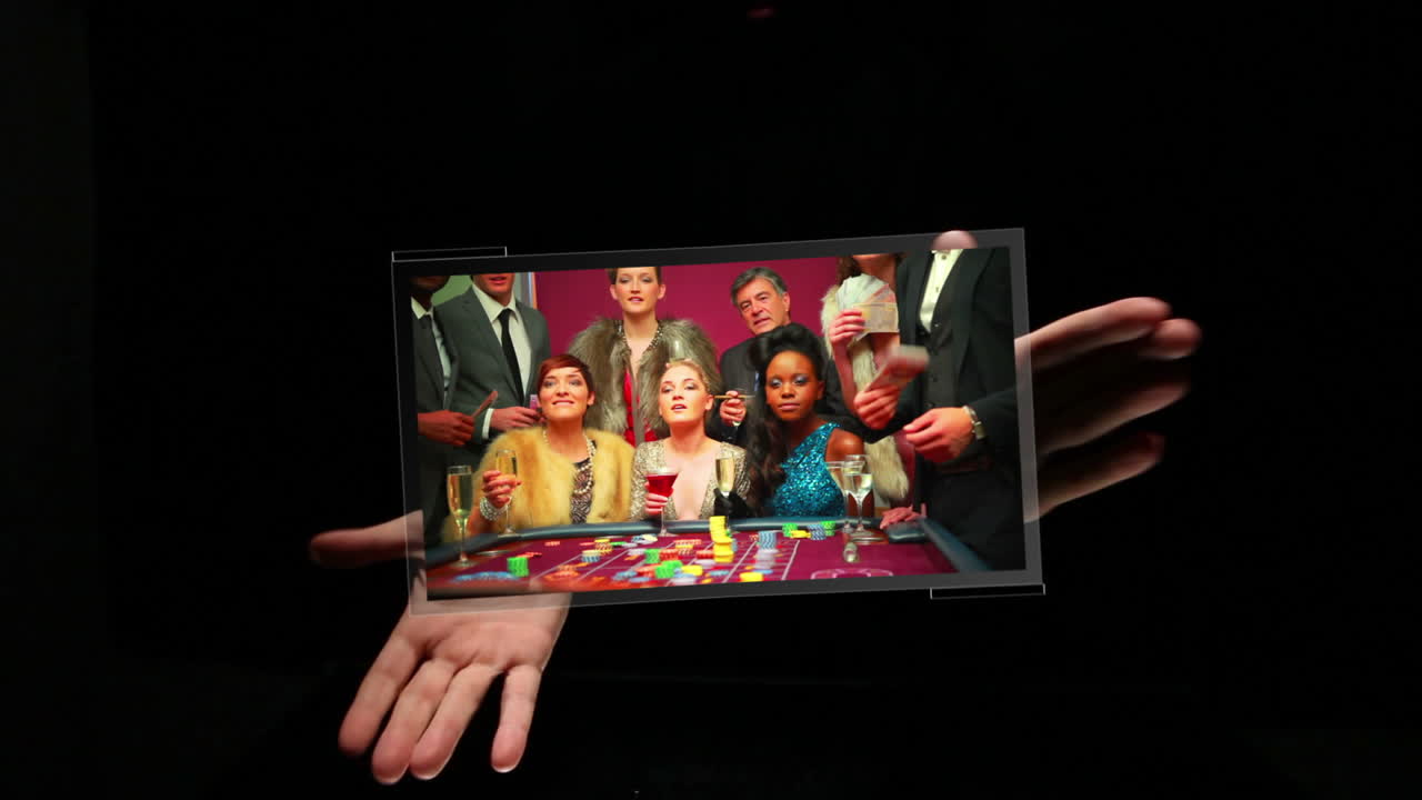 las manos aplaudiendo y presentando videos de casinos