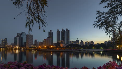 a 4k time lapse of sunrise at benjakitti park, bangkok, thailand