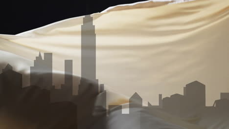 animation of silhouette of cityscape and floating cloth on black background