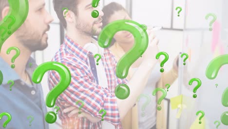 animation of green question marks over business people looking at memo notes