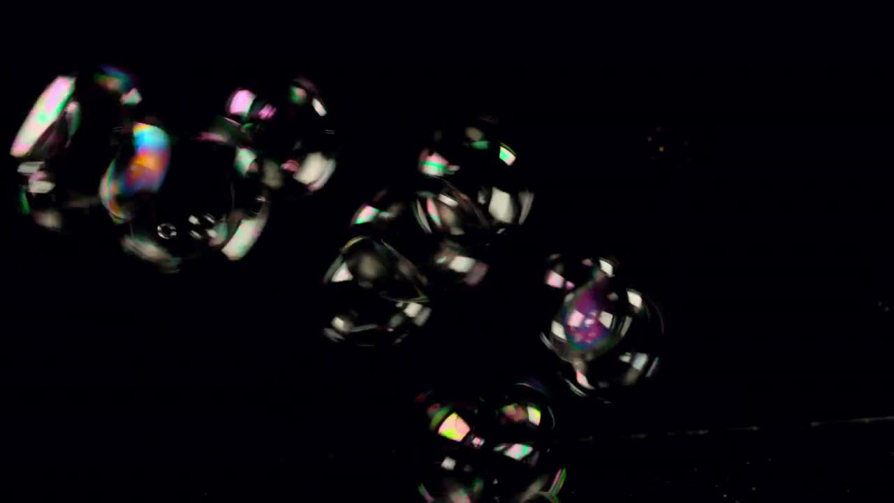 Bubbles floating on black background