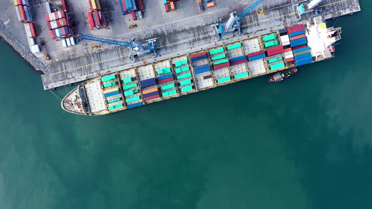 Aerial drone view of container terminal and containers ship at the port of Burgas. Logistics and transport