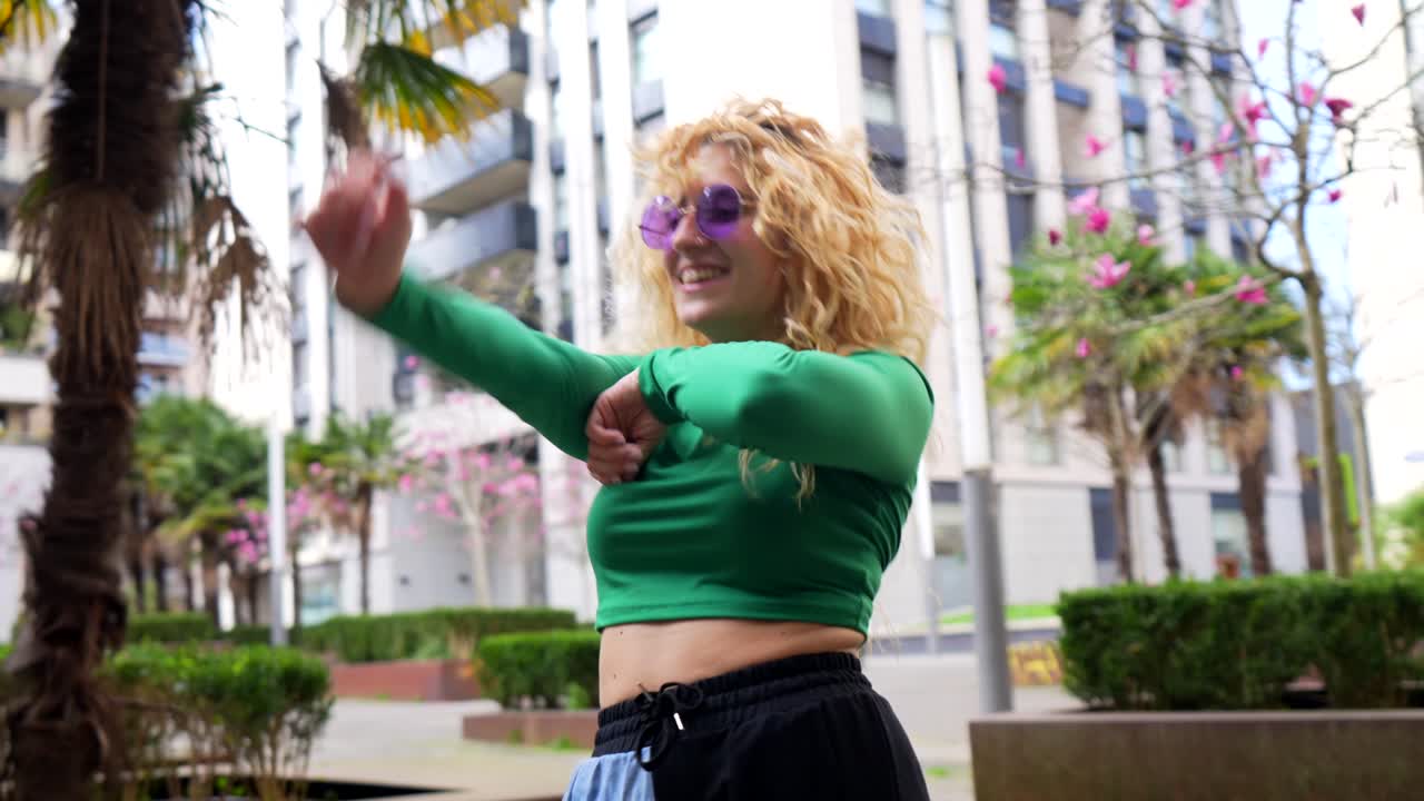 Woman dancing in an urban setting