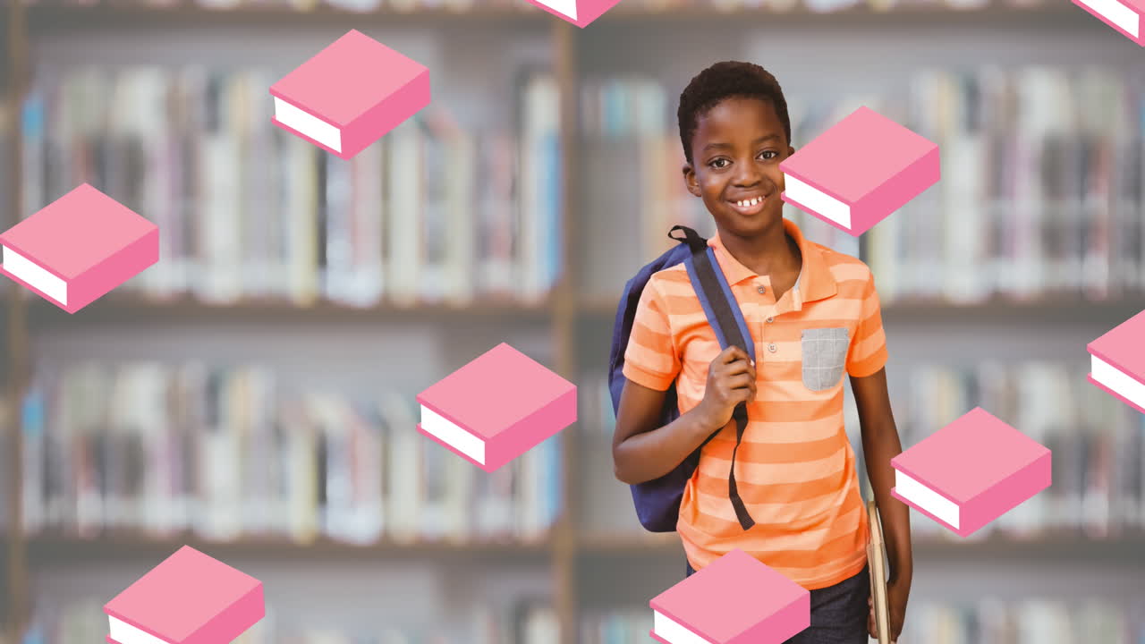 Animation of books falling over smiling african american schoolboy