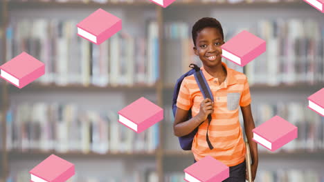animation of books falling over smiling african american schoolboy