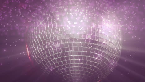 pink light spots animate over a disco ball, embodying nightlife glamour.