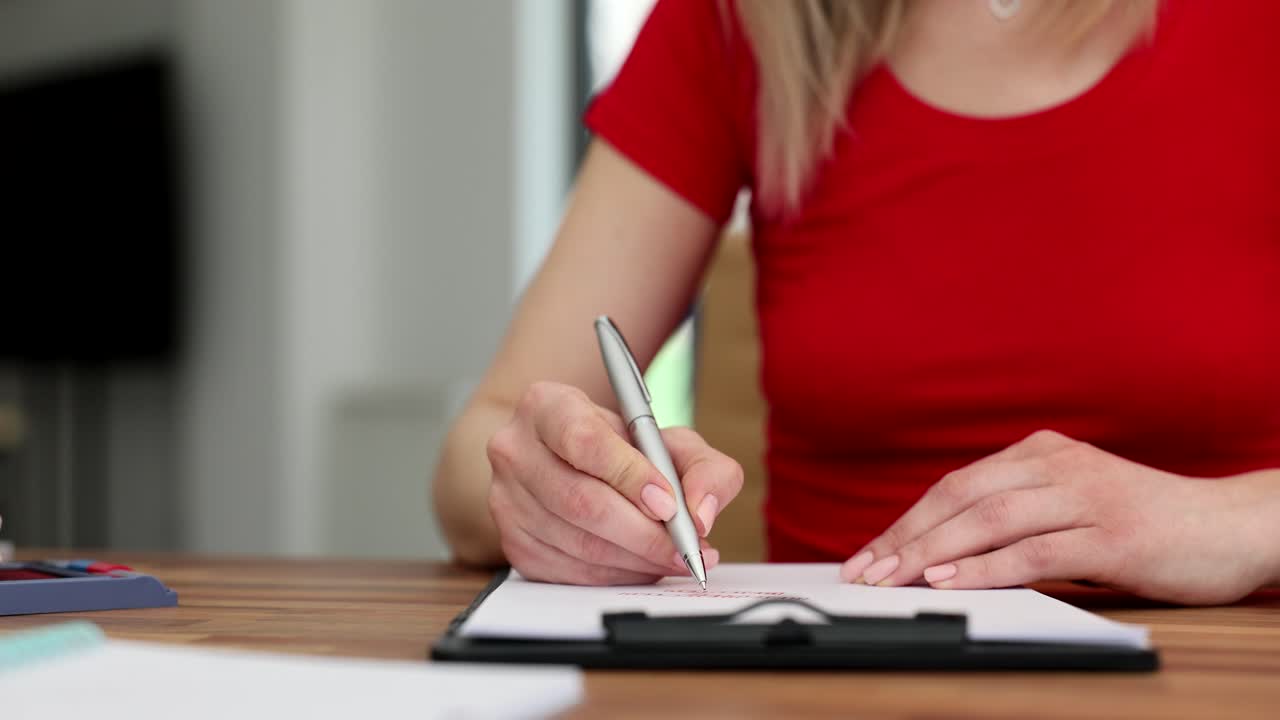 Woman stamping documents in an office