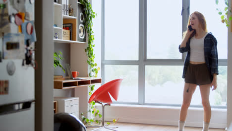 female executive talking on mobile phone at office 4k