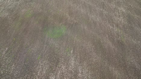 Flying-Over-Open-Dirt-Farmland.-Aerial-Drone-Shot