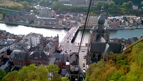 view of the city of dinant, belgium on river maas