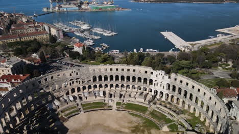 drone of pula ancient roman arena and adriatic sea