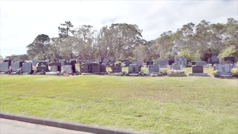 shot of cemetery and tombstone for funeral burial from covid 19 pandemic outbreak