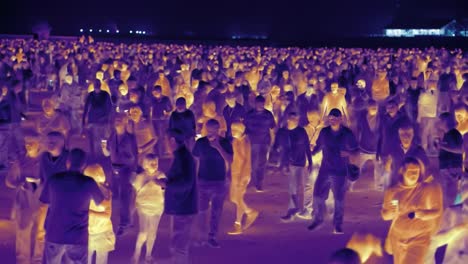 a surreal gathering of people in infrared view, capturing the unique glow of a large crowd at night, highlighting their silhouetted figures and expressions