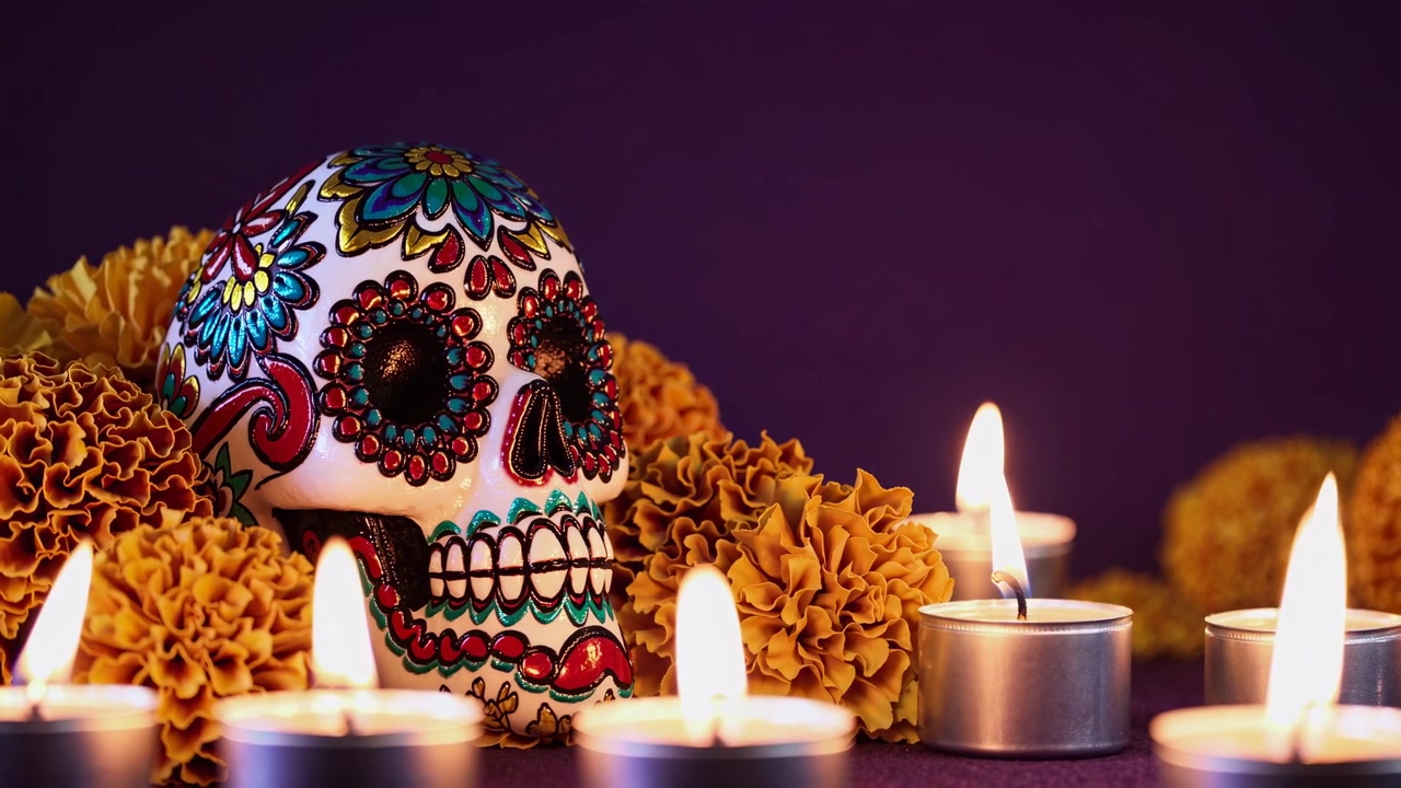 Day of the Dead Sugar Skull with Marigolds and Candles