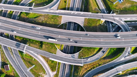 highways and freeways with numerous cars. system of roads in the rural area of slovakia. top view