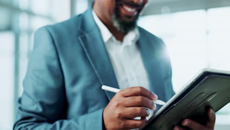 a businessman using a tablet with a digital pen