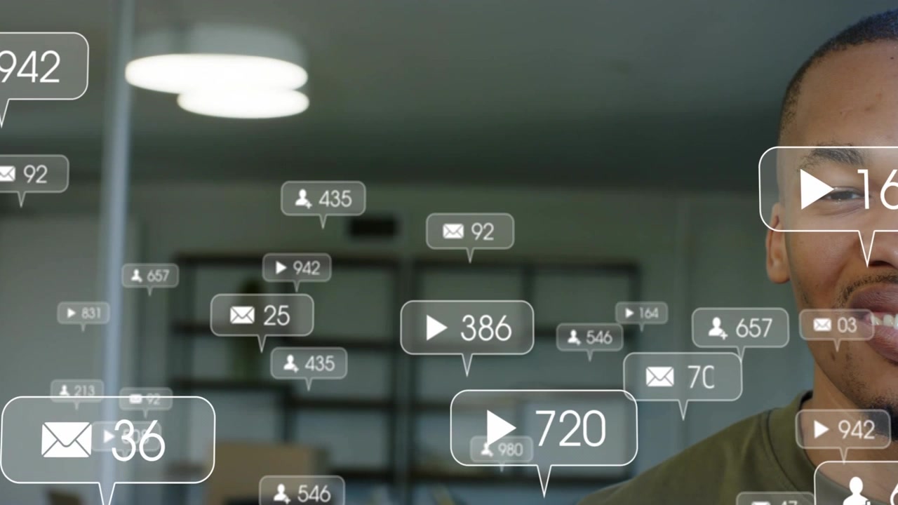 Vertical video: Post sparking play and mail icons filling while man smiling showing engagement
