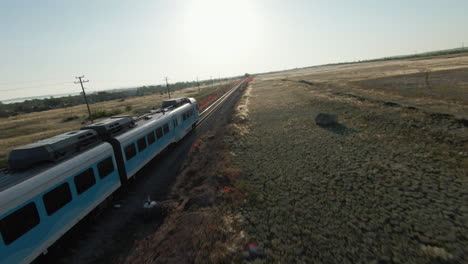 train traveling through rural landscape