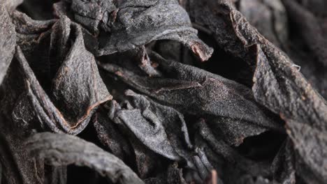 black large-leaf tea super macro close up.