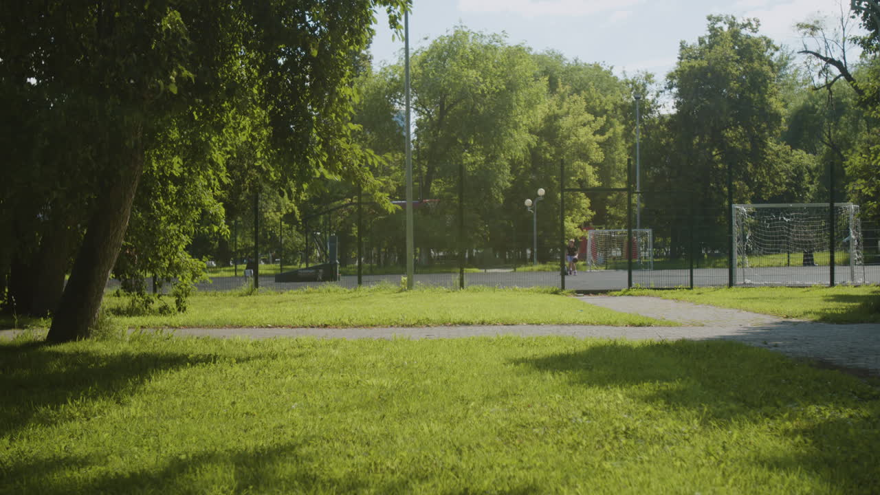 Kids Running Through a Park on a Sunny Day