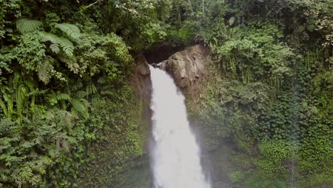 nungnung waterfall in the middle of bali, indonesia