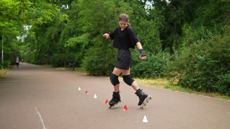 teenage girl roller skating practice in park