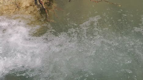 Crystal-clear-water-emerging-from-a-hot-spring