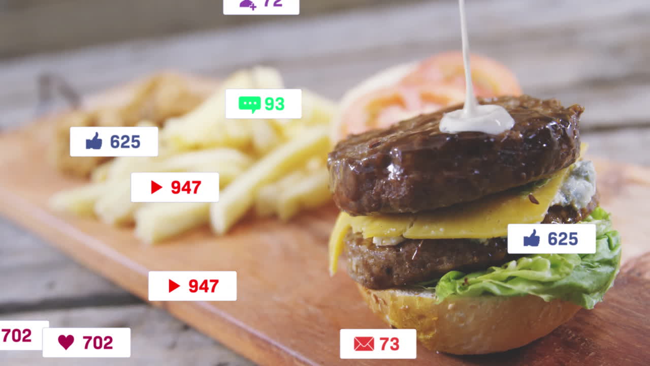 Animation of burger and fries with social media notifications popping up