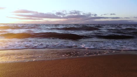 beautiful autumn sunset and waves in the sea