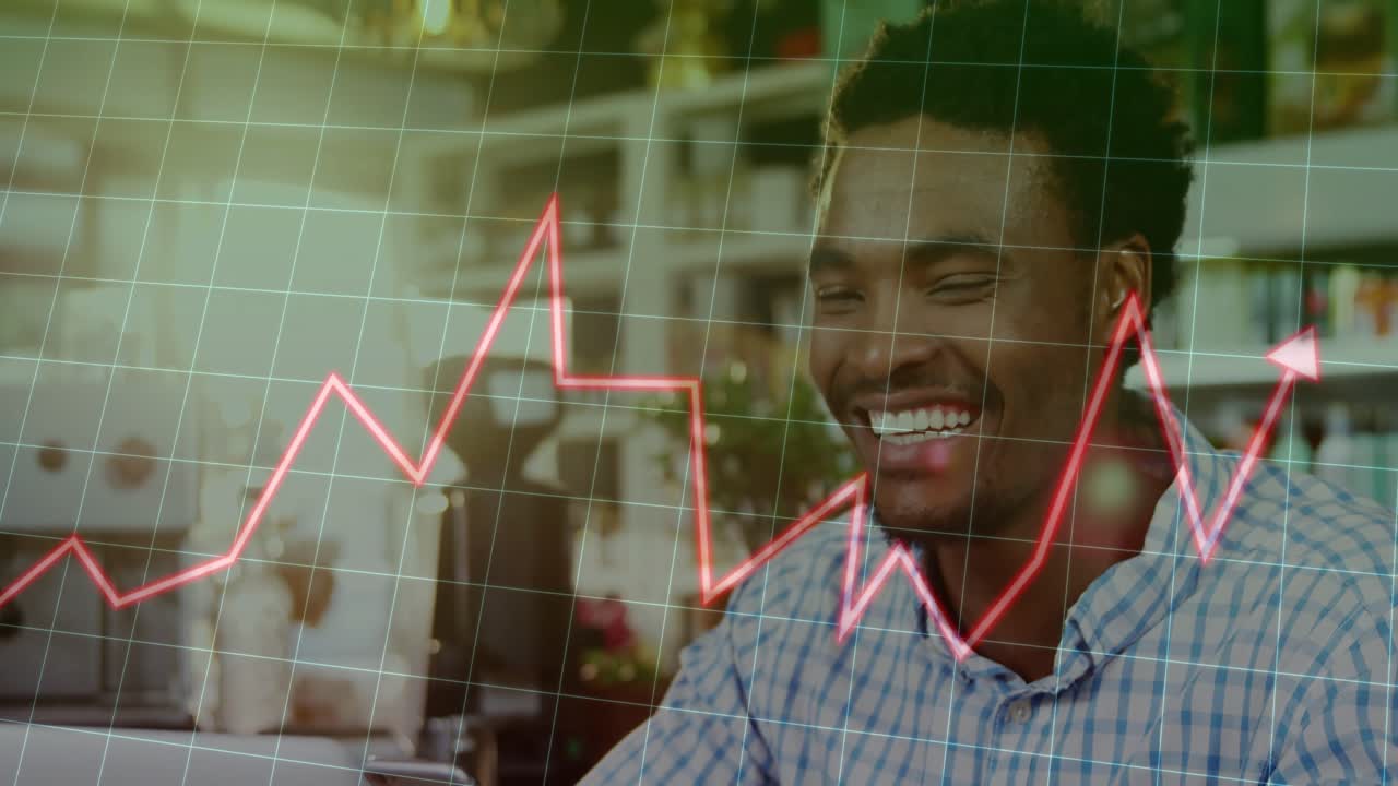 Man at desk using phone, initiating red finance chart tracking gains, sweeping face, smiling