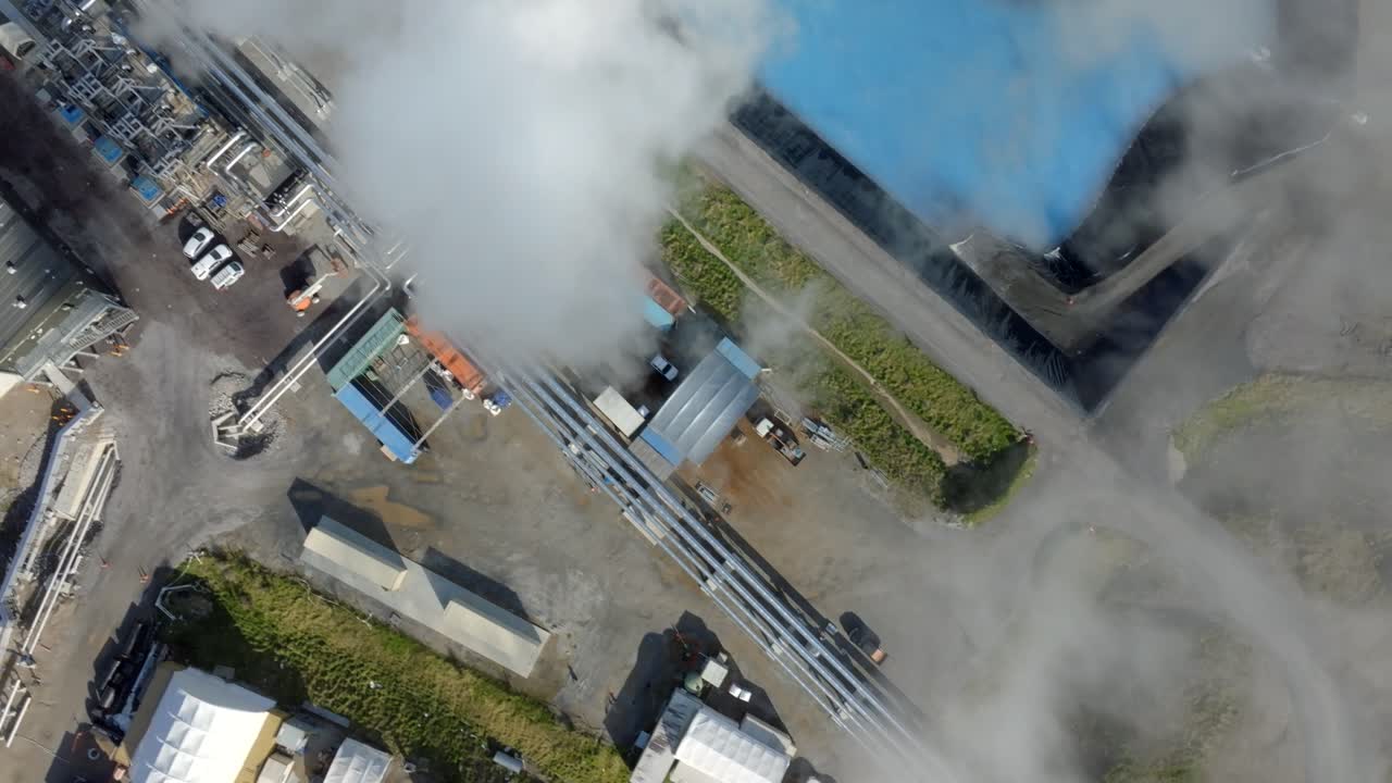 Overhead view of a geothermal power plant with artificial wells