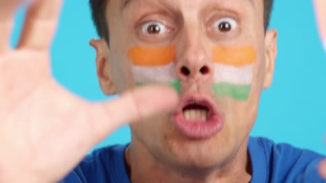 close up of a man supporting indian team