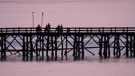 The-Mon-Bridge-is-an-old-wooden-bridge-located-in-Sangkla,-Thailand