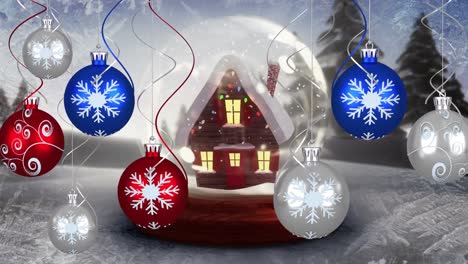 Animation-of-silver,-blue-and-red-baubles-christmas-decoration-with-snow-globe-and-winter-scenery