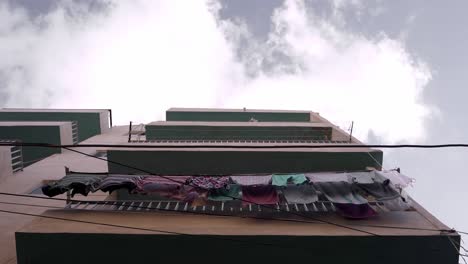 laundry hanging on clothesline in residential building