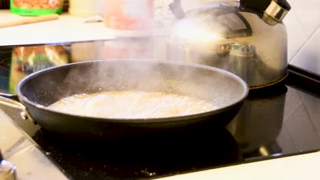 ingredients simmer in hot pan