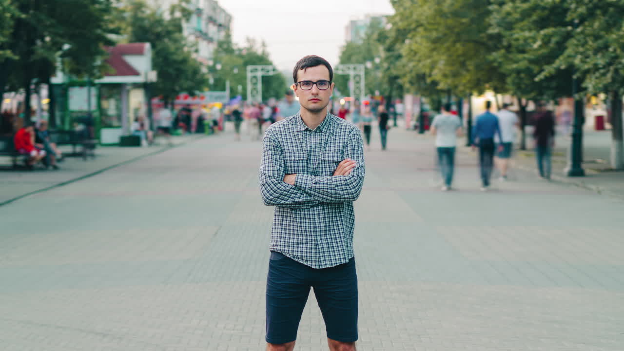 Man standing on a city street