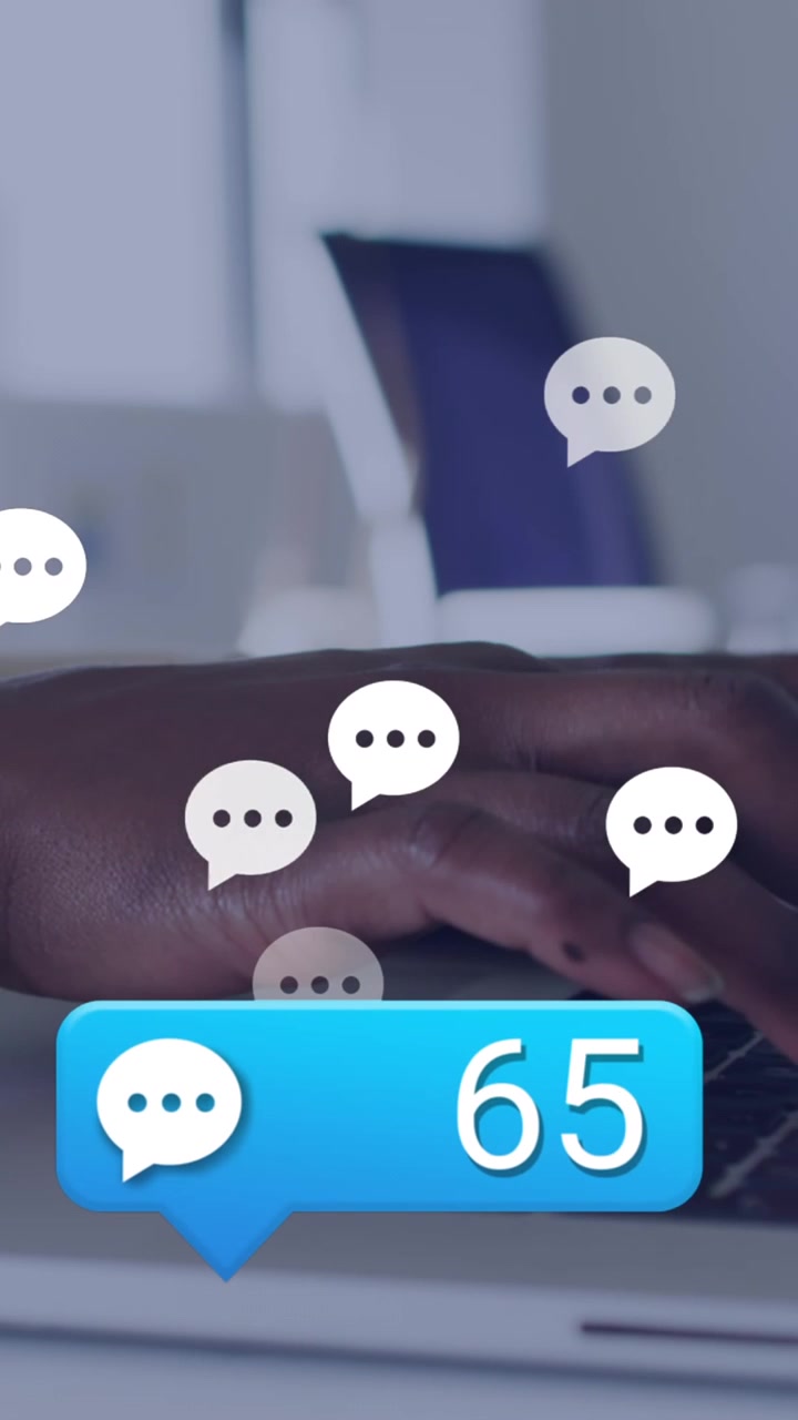 Animation of social media icons over mid section of african american woman using laptop at office