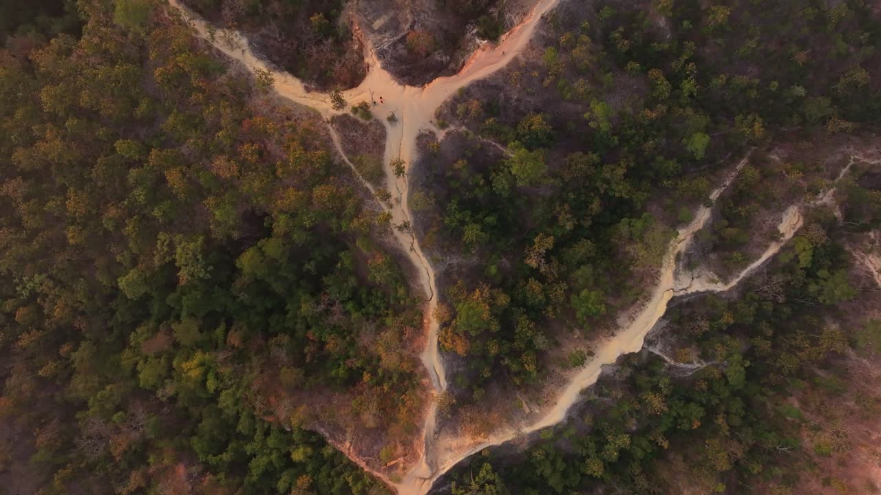 Morning drone view over dramatic Pai Canyon cliffs and trails, Thailand