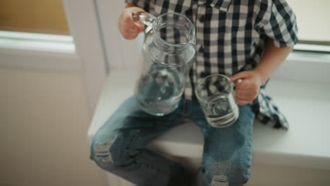 child pouring water