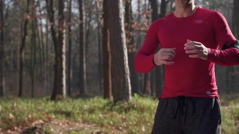 man warming up before jogging