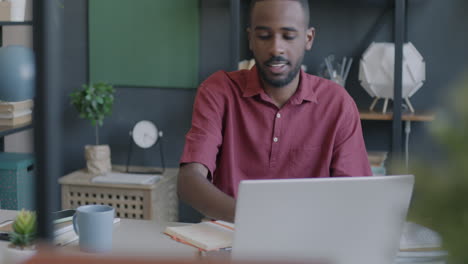 man working in modern home office