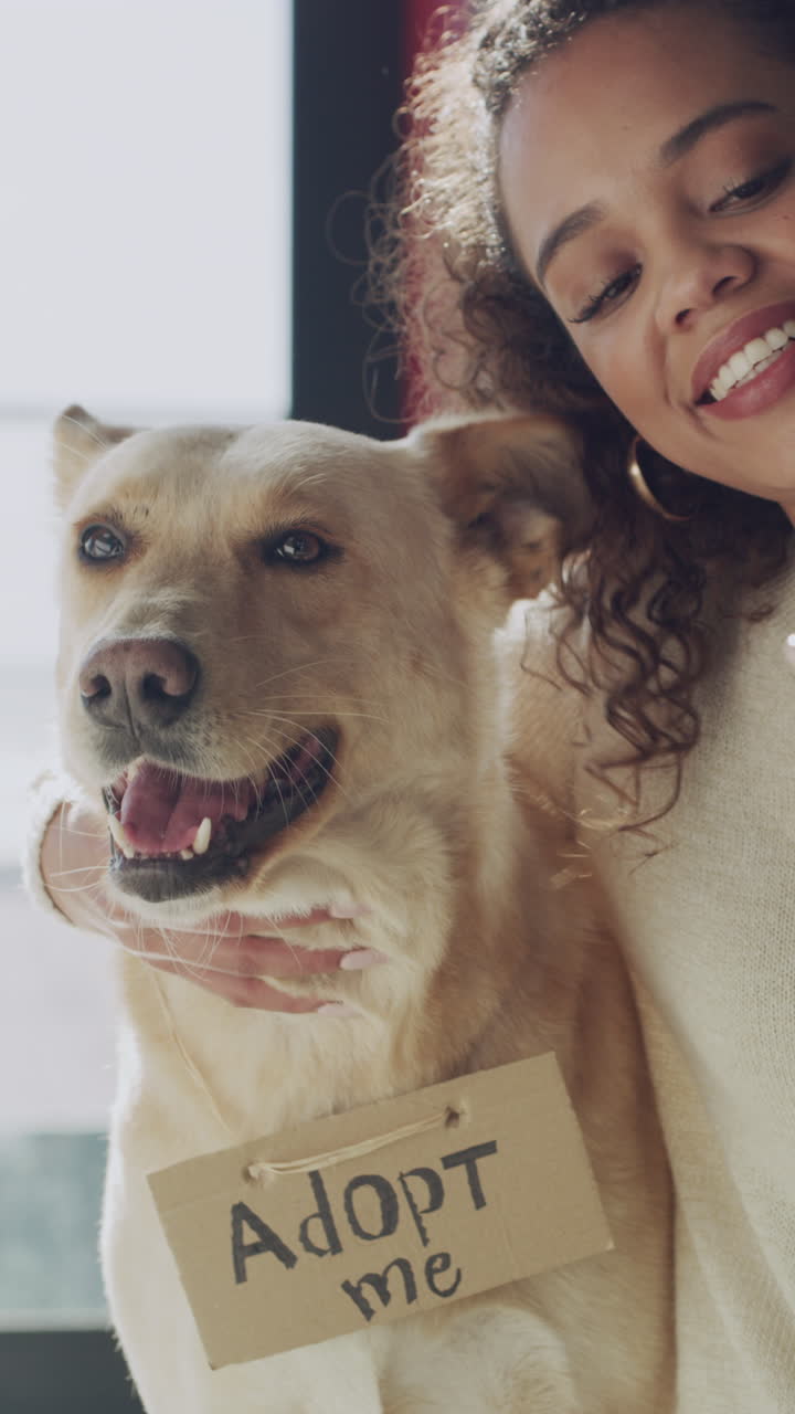 Happy Woman Takes Selfie with Dog Wearing 'Adopt Me' Sign