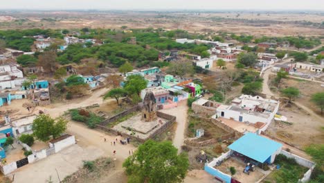 revolving aerial drone shot of an ancient hindu shiv temple of gurjara pratihara era in a village of central india near gohad madhya pradesh