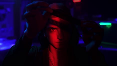 man in a cap with intense lighting