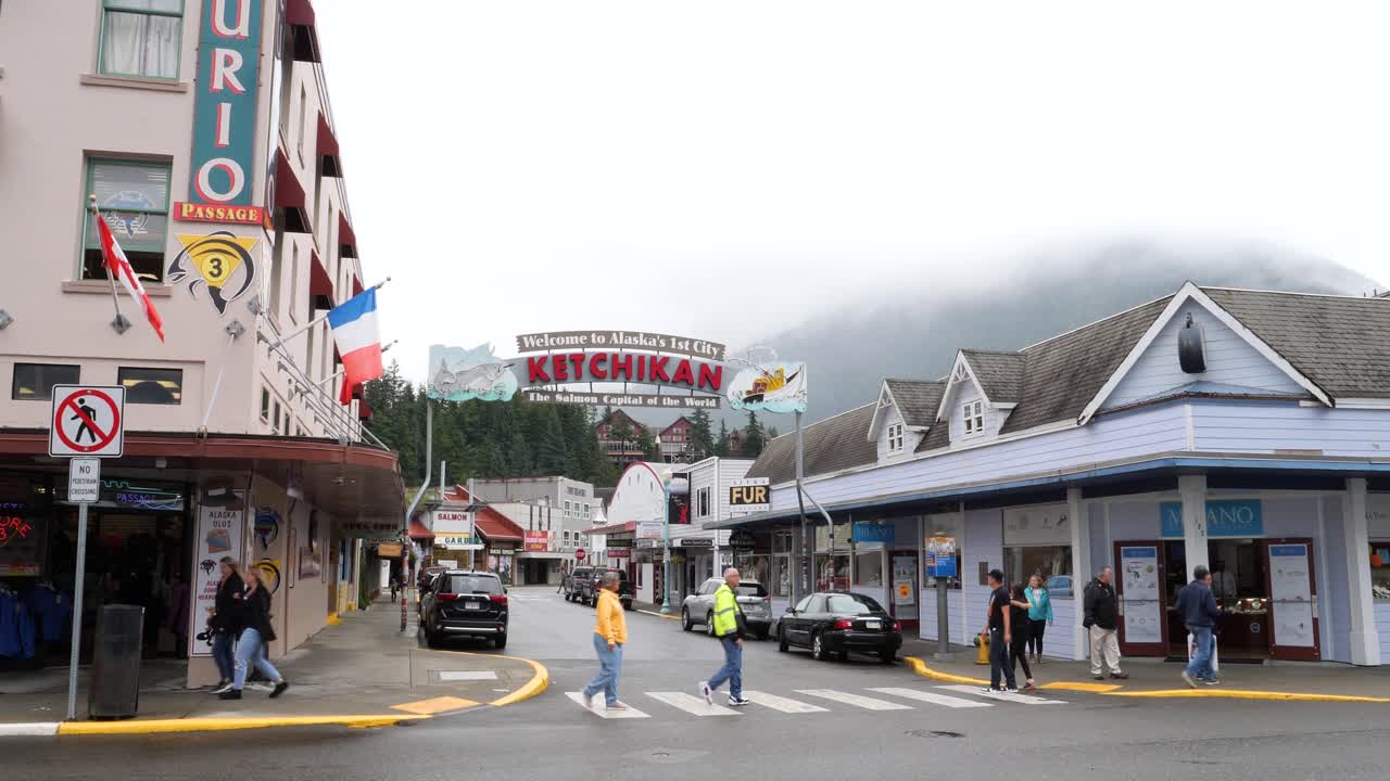 Ketchikan's famous street city sign over Mission St just as it meets Front St. Ketchikan one of the most popular tourist cities and a favourite cruise stop in Alaska.