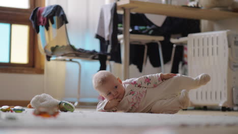 eight months child on the floor at home