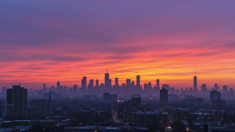 stunning skyline transition: vibrant sunset to enigmatic nightfall over a bustling urban cityscape captured in dynamic frames